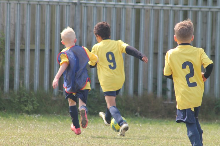 Southside Star players celebrating and running back after a goal