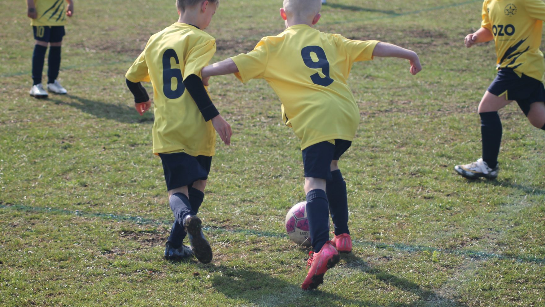 Southside Star Youth FC players competing for the ball during a match in Cheltenham